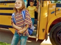 children_getting_off_school_bus_1779324
